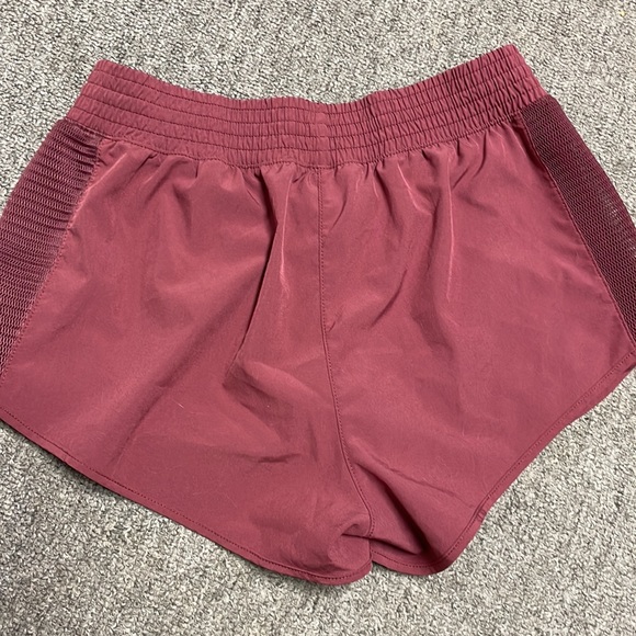 Dark coral athletic shorts with built in honeycomb undershorts! - Picture 2 of 3